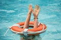 Need for helping hand. Life problems concept. Drowning person. Rescue swimming ring. Royalty Free Stock Photo