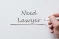 Need lawyer written on whiteboard Royalty Free Stock Photo