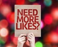 Need More Likes? written on colorful background with defocused lights Royalty Free Stock Photo