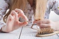 Need more vitamins, Woman with hair problems, lost hair on comb Royalty Free Stock Photo