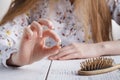 Need more vitamins, Woman with hair problems, lost hair on comb Royalty Free Stock Photo