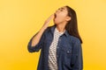 Need rest. Portrait of tired drowsy girl in denim shirt yawning wide, feeling sleepy and exhausted, waking up