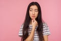 Need to think! Portrait of pensive girl with long hair pondering idea, doubting in choice, reflecting visualizing in mind Royalty Free Stock Photo