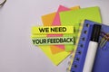 We Need Your Feedback on sticky notes isolated on white background Royalty Free Stock Photo