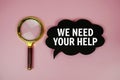 We Need Your Help text on speech bubble with magnifying glass on pink background Royalty Free Stock Photo