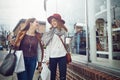 We needed a day like this. two young women out on a shopping spree. Royalty Free Stock Photo