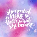 She needed a hero, so that`s what she became. Inspirational feminism quote about woman. Typography at purple and pink Royalty Free Stock Photo