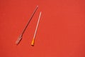 Needle decompression during pneumothorax, emergency medical help. on a red background