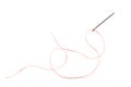 Needle with orange thread on a white background. Sewing accessories needle and thread Royalty Free Stock Photo