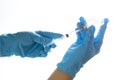 A needle and a vaccination bottle in the doctor`s hand