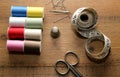 Needlework essentials on a wooden sewing table Royalty Free Stock Photo