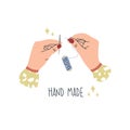 Needlework and handmade concept. Female hands holding thread and needle. Logo for a sewing workshop. Illustration hand drawing in