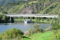 Neef, Germany - 09 02 2021: white long passenger ship under the Mosel bridge Neef