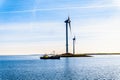 Fishing Boat and Wind Turbines at the Oosterschelde inlet at the Neeltje Jans island in Zeeland Province in the Netherlands Royalty Free Stock Photo