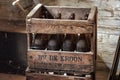 NEERIJSE, BELGIUM - SEPTEMBER 05, 2014: Wooden box with old vintage beer bottles in the brewery De Kroon in Neerijse.