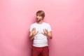 Negative human facial expressions, emotions and feelings. Portrait of squeamish disgusted young man Royalty Free Stock Photo