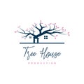 Negative space house in oak tree logo design