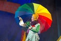 Negev, Beer-Sheva, Israel, 2015 - children's play great actress with a bright colored umbrella