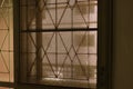 Neglected dirty wire mesh of screen door Royalty Free Stock Photo