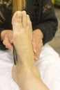 foot care. feet in foamy water
