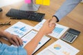 Negotiating business, Two confident business man shaking hands with partners together after finishing up a meeting succeeded Royalty Free Stock Photo