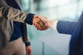 Negotiating deals to stretch success further. Closeup shot of two unrecognisable businesswomen shaking hands in an Royalty Free Stock Photo