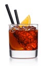 Negroni Cocktail in modern glass with ice cubes and orange slices with straw on white background with reflection Royalty Free Stock Photo