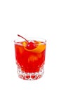 Negroni. Red drink cocktail in glass jar with cherry and orange peel isolated on white background Royalty Free Stock Photo