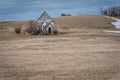 Neidpath, SaskatchewanÃ¢â¬â¢s abandoned church with a classic, abandoned car Royalty Free Stock Photo