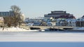 Neighborhood of old houses and modern buildings in winter. Retro versus modern style. Contrast in architecture. Royalty Free Stock Photo