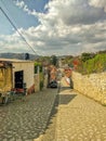 Neighborhood street paved with marble stones in Ixcateopan, dowhill view. Travel in Mexico