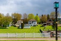 Neighborhood of typical small houses with green lawn in Port Gamble, Washington, USA