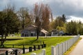 Neighborhood of typical small houses with green lawn in Port Gamble, Washington, USA Royalty Free Stock Photo