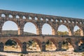 Neighborhoods of the Roman aqueduct Pont du Gard on the river Gardon Royalty Free Stock Photo