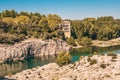 Neighborhoods of the Roman aqueduct Pont du Gard on the river Gardon Royalty Free Stock Photo