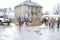 Neighbours and residents working to fill sand bags