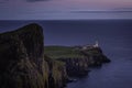 Neist Point, famous landmark with lighthouse on Isle of Skye, Scotland at blue hour Royalty Free Stock Photo