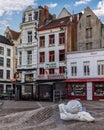 Nello & Patrache statue in Antwerp, Belgium, in front of a picturesque background