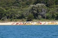 People and kayaks at Anchorage Beach in Abel Tasman National Park