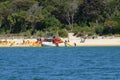 People and kayaks at Anchorage Beach in Abel Tasman National Park