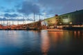 Nemo Science Museum with in front historical commercial ships al