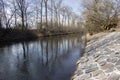 Nemosicka stran forest on the end of winter time, sunlight in branches, way throught amazing natural area, river