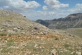 Nemrut Dagi. Mountains on the background of sky. Vertices covered with snow. Tourism