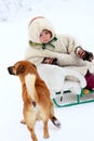 Nenets child in national dress and the dog