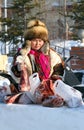 The Nenets woman holds deer meat in hand