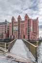 Hamburg, Germany - November 9, 2019: Neo-gothic red brick maritime museum in Hamburg Habor area with clouds