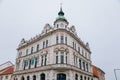 Neo-Renaissance white building of the former Farmers` bank Podripska with red sgraffito mural decorated plaster in Roudnice nad Royalty Free Stock Photo