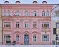 Neoclassical building painted in pink in the city of Tartu