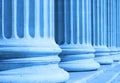 Neoclassical columns closeup blue - business concept Royalty Free Stock Photo