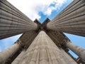 Neoclassical Columns from Low Angle Perspective - Dramatic low-angle view looking straight up between monumental fluted stone Royalty Free Stock Photo